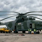 Mil Mi-26 world biggest operational heavy lift helicopter on airfield tarmac